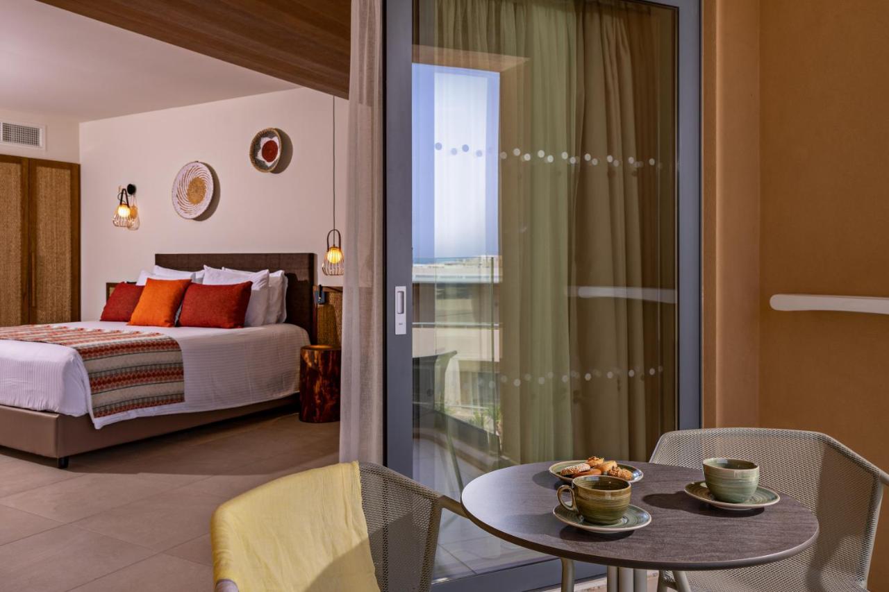 Minos Ambassador Suites & Spa - Adults Only 罗希姆诺 外观 照片