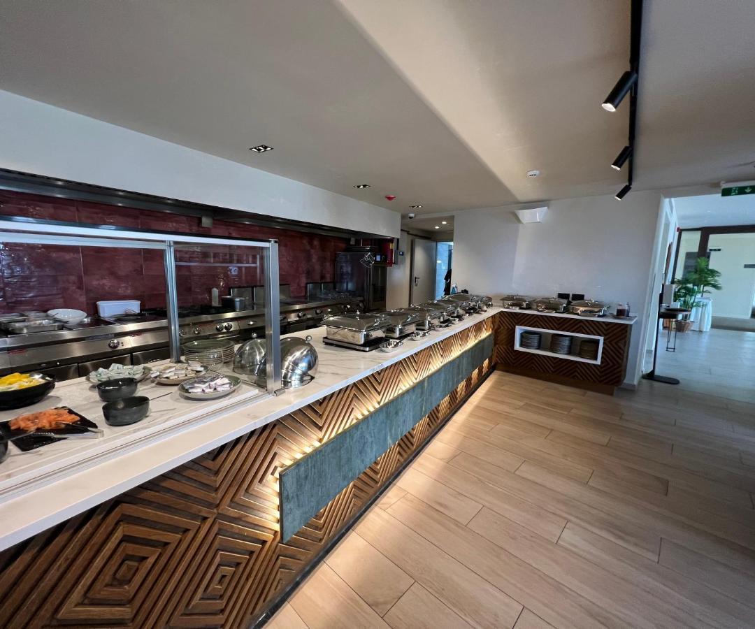 Minos Ambassador Suites & Spa - Adults Only 罗希姆诺 外观 照片